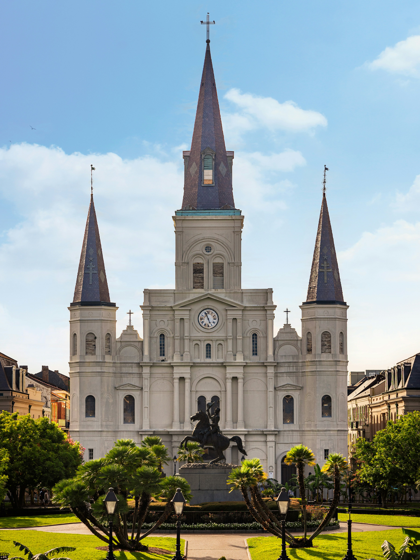 A daytime photo of the Seattle Space Needle against a blue sky.
